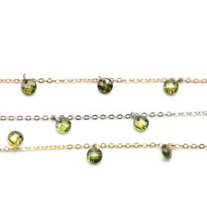 Chains with peridot zircons, round cut