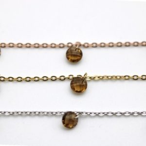 Chain with smoky zircon, round cut