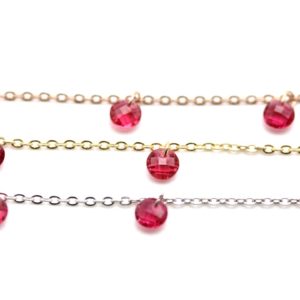 Chain with red zircons, round cut