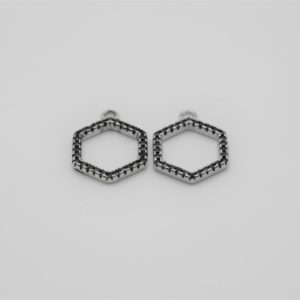 Hexagonal charms withh black zircons