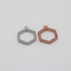 Hexagonal charm with zircons